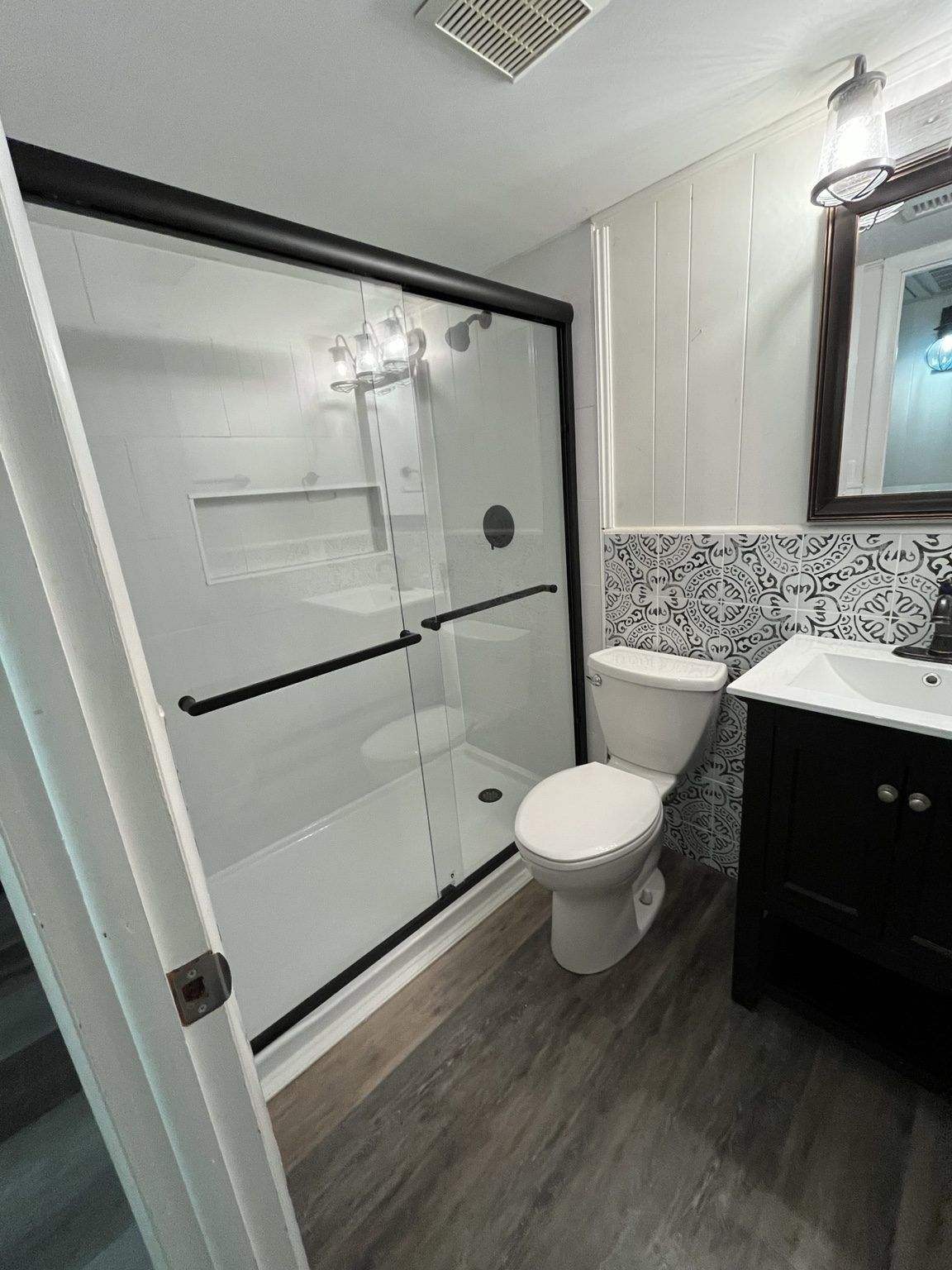 Black-framed shower remodel