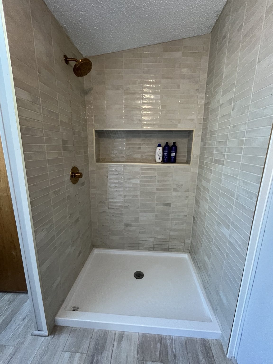 Bathroom tile installation in progress