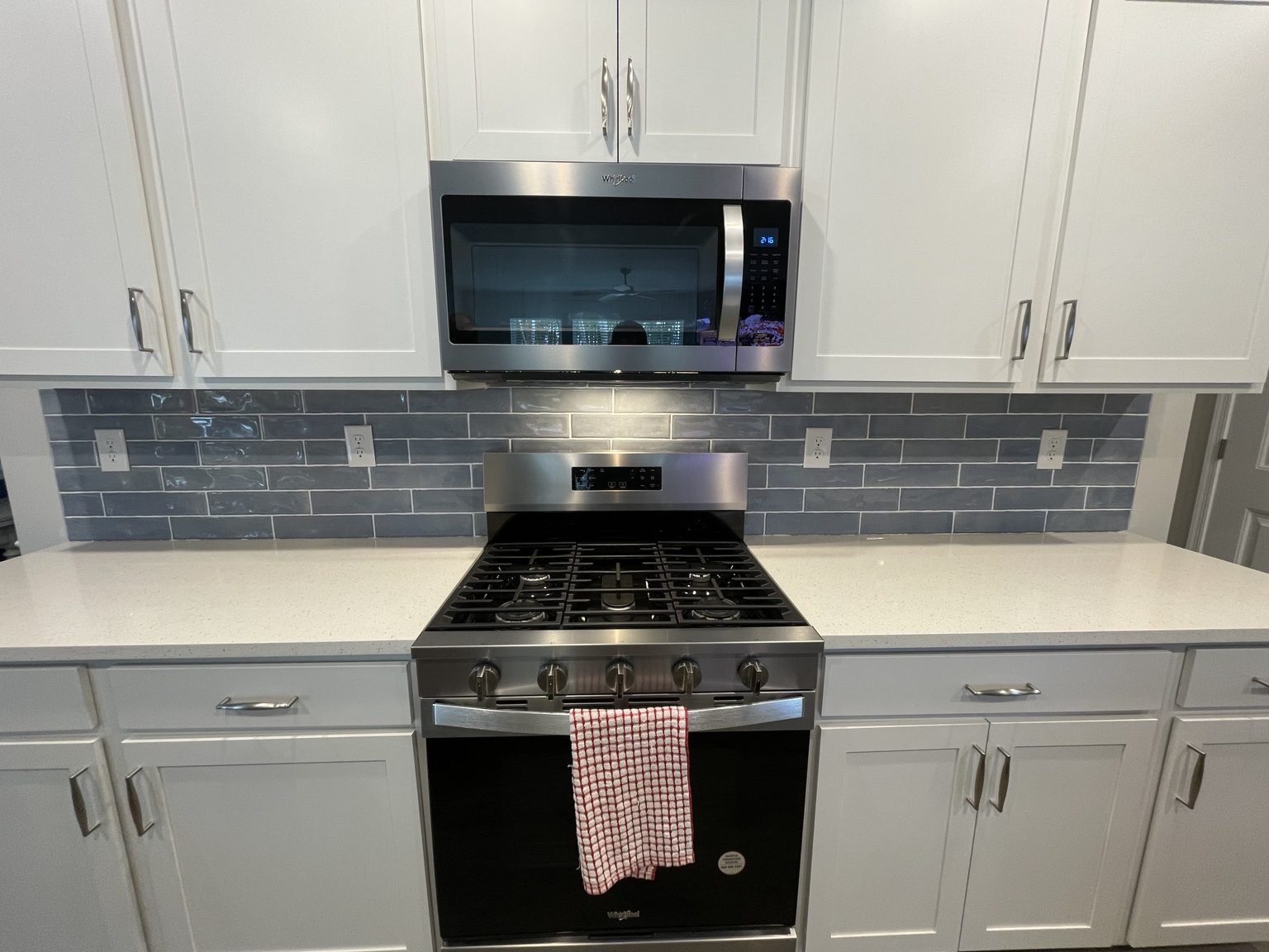 Blue subway tile backsplash